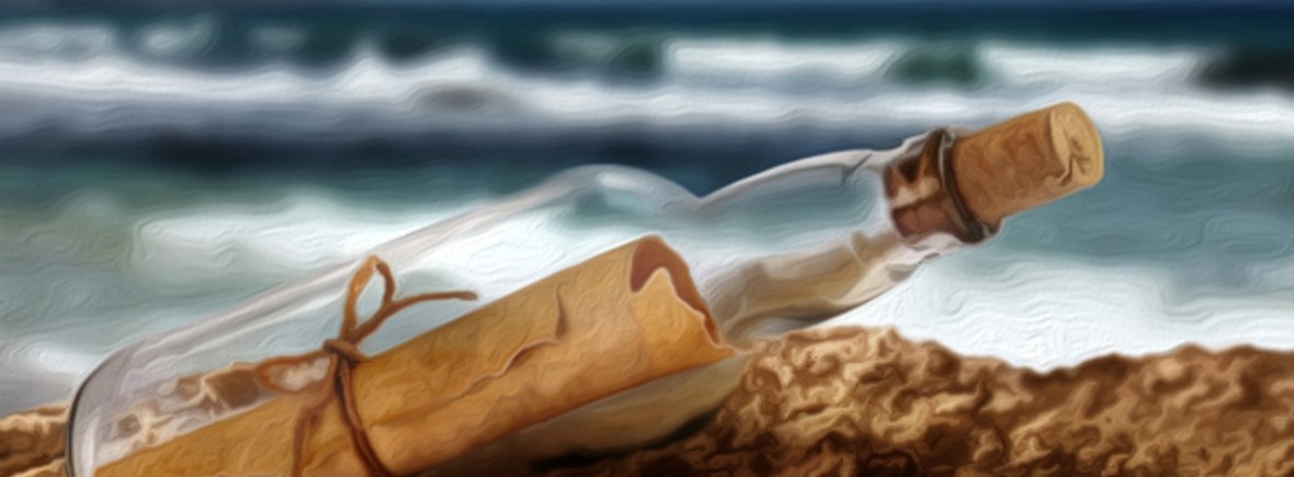 Message in a bottle in the sand